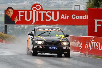 68;26-February-2012;68;Aaron-Harris;Australia;BMW-135i;Bathurst;Bathurst-12-Hour;David-Glasson;Dennis-Roderick;Motorsport-Services;Mt-Panorama;NSW;New-South-Wales;auto;endurance;motorsport;racing;rain;telephoto;wet