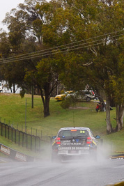 26;26;26-February-2012;Angus-Chapel;Australia;BMW-130i;Bathurst;Bathurst-12-Hour;GWS-Personnel-Motorsport;Mt-Panorama;NSW;New-South-Wales;Richard-Gartner;Tony-Prior;auto;endurance;motorsport;racing;rain;telephoto;wet