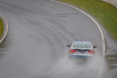 28;26-February-2012;Australia;BMW-335i;Bathurst;Bathurst-12-Hour;Christian-DAgostin;GWS-Personnel-Motorsport;Garth-Duffy;Mt-Panorama;NSW;New-South-Wales;Peter-ODonnell;auto;endurance;motorsport;racing;rain;telephoto;wet