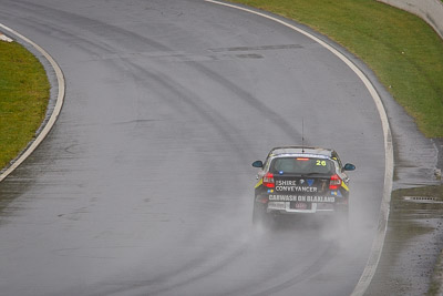 26;26;26-February-2012;Angus-Chapel;Australia;BMW-130i;Bathurst;Bathurst-12-Hour;GWS-Personnel-Motorsport;Mt-Panorama;NSW;New-South-Wales;Richard-Gartner;Tony-Prior;auto;endurance;motorsport;racing;rain;telephoto;wet