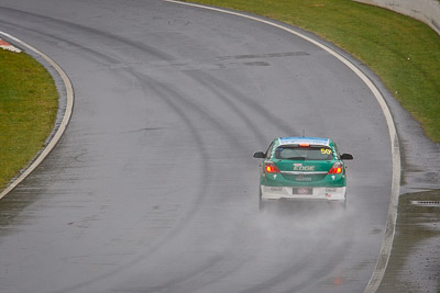 50;26-February-2012;Australia;Bathurst;Bathurst-12-Hour;Chris-Pither;Elliot-Barbour;Holden-HSV-VXR;Mt-Panorama;NSW;New-South-Wales;Racer-Industries;Scott-Pye;auto;endurance;motorsport;racing;rain;telephoto;wet