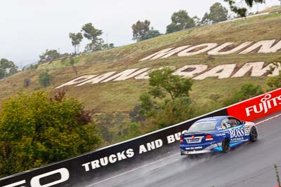 53;26-February-2012;Australia;Bathurst;Bathurst-12-Hour;Dean-Lillie;Holden-HSV-GTS;James-Atkinson;Mt-Panorama;NSW;New-South-Wales;Rick-Newman;auto;endurance;motorsport;racing;rain;telephoto;wet