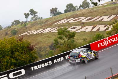 26;26;26-February-2012;Angus-Chapel;Australia;BMW-130i;Bathurst;Bathurst-12-Hour;GWS-Personnel-Motorsport;Mt-Panorama;NSW;New-South-Wales;Richard-Gartner;Tony-Prior;auto;endurance;motorsport;racing;rain;telephoto;wet