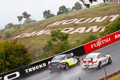 65;67;26-February-2012;65;67;Antony-Head;Australia;BMW-135i;Bathurst;Bathurst-12-Hour;Brett-Niall;John-De-Veth;Lewis-Scott;Motorsport-Services;Mt-Panorama;NSW;New-South-Wales;Porsche-911-GT3-Cup-997;Scott-ODonnell;Simon-McLennon;Todd-Murphy;Topshot;auto;endurance;motorsport;racing;rain;telephoto;wet