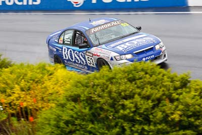 53;26-February-2012;Australia;Bathurst;Bathurst-12-Hour;Dean-Lillie;Holden-HSV-GTS;James-Atkinson;Mt-Panorama;NSW;New-South-Wales;Rick-Newman;auto;endurance;motorsport;racing;rain;telephoto;wet