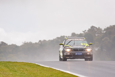 67;26-February-2012;67;Antony-Head;Australia;BMW-135i;Bathurst;Bathurst-12-Hour;John-De-Veth;Lewis-Scott;Motorsport-Services;Mt-Panorama;NSW;New-South-Wales;Todd-Murphy;auto;endurance;motorsport;racing;rain;super-telephoto;wet