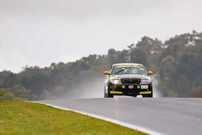 26;26;26-February-2012;Angus-Chapel;Australia;BMW-130i;Bathurst;Bathurst-12-Hour;GWS-Personnel-Motorsport;Mt-Panorama;NSW;New-South-Wales;Richard-Gartner;Tony-Prior;auto;endurance;motorsport;racing;rain;super-telephoto;wet