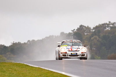 65;26-February-2012;65;Australia;Bathurst;Bathurst-12-Hour;Brett-Niall;Motorsport-Services;Mt-Panorama;NSW;New-South-Wales;Porsche-911-GT3-Cup-997;Scott-ODonnell;Simon-McLennon;auto;endurance;motorsport;racing;rain;super-telephoto;wet