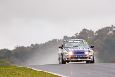 53;26-February-2012;Australia;Bathurst;Bathurst-12-Hour;Dean-Lillie;Holden-HSV-GTS;James-Atkinson;Mt-Panorama;NSW;New-South-Wales;Rick-Newman;auto;endurance;motorsport;racing;rain;super-telephoto;wet