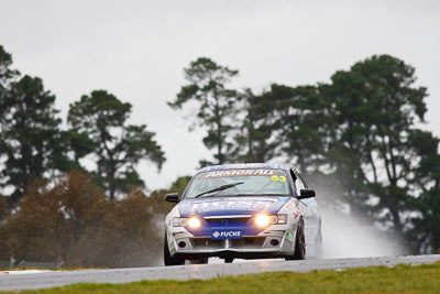 53;26-February-2012;Australia;Bathurst;Bathurst-12-Hour;Dean-Lillie;Holden-HSV-GTS;James-Atkinson;Mt-Panorama;NSW;New-South-Wales;Rick-Newman;auto;endurance;motorsport;racing;rain;super-telephoto;wet