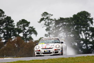 65;26-February-2012;65;Australia;Bathurst;Bathurst-12-Hour;Brett-Niall;Motorsport-Services;Mt-Panorama;NSW;New-South-Wales;Porsche-911-GT3-Cup-997;Scott-ODonnell;Simon-McLennon;auto;endurance;motorsport;racing;rain;super-telephoto;wet