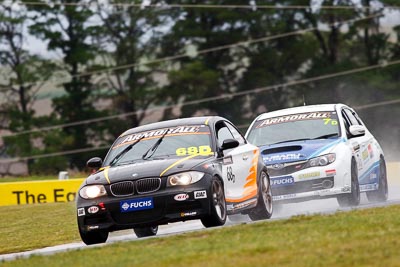 68;26-February-2012;68;Aaron-Harris;Australia;BMW-135i;Bathurst;Bathurst-12-Hour;David-Glasson;Dennis-Roderick;Motorsport-Services;Mt-Panorama;NSW;New-South-Wales;auto;endurance;motorsport;racing;rain;super-telephoto;wet