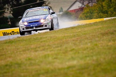 53;26-February-2012;Australia;Bathurst;Bathurst-12-Hour;Dean-Lillie;Holden-HSV-GTS;James-Atkinson;Mt-Panorama;NSW;New-South-Wales;Rick-Newman;auto;endurance;motorsport;racing;rain;super-telephoto;wet