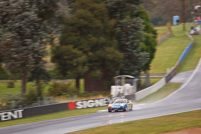 32;26-February-2012;Australia;Bathurst;Bathurst-12-Hour;Gerry-Murphy;Jim-Pollicina;Mazda-RX‒7;Mazda-RX7;Michael-Caine;Mt-Panorama;NSW;New-South-Wales;auto;endurance;motion-blur;motorsport;racing;rain;super-telephoto;wet