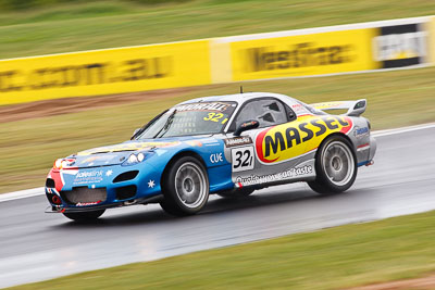 32;26-February-2012;Australia;Bathurst;Bathurst-12-Hour;Gerry-Murphy;Jim-Pollicina;Mazda-RX‒7;Mazda-RX7;Michael-Caine;Mt-Panorama;NSW;New-South-Wales;auto;endurance;motion-blur;motorsport;racing;rain;super-telephoto;wet