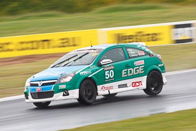 50;26-February-2012;Australia;Bathurst;Bathurst-12-Hour;Chris-Pither;Elliot-Barbour;Holden-HSV-VXR;Mt-Panorama;NSW;New-South-Wales;Racer-Industries;Scott-Pye;auto;endurance;motion-blur;motorsport;racing;rain;super-telephoto;wet