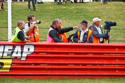 26-February-2012;Australia;Bathurst;Bathurst-12-Hour;Dirk-Klynsmith;Joel-Strickland;Mt-Panorama;NSW;New-South-Wales;atmosphere;auto;endurance;motorsport;paddock;photographers;portrait;racing;telephoto