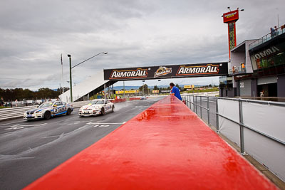 28;65;26-February-2012;65;Australia;BMW-335i;Bathurst;Bathurst-12-Hour;Brett-Niall;Christian-DAgostin;GWS-Personnel-Motorsport;Garth-Duffy;Motorsport-Services;Mt-Panorama;NSW;New-South-Wales;Peter-ODonnell;Porsche-911-GT3-Cup-997;Scott-ODonnell;Simon-McLennon;auto;endurance;motorsport;racing;rain;wet;wide-angle