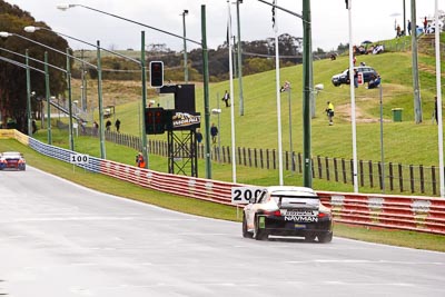 66;26-February-2012;Allan-Dippie;Australia;Bathurst;Bathurst-12-Hour;Bruce-Thomlinson;Mark-Maddren;Motorsport-Services;Mt-Panorama;NSW;New-South-Wales;Porsche-911-GT3-Cup-996;auto;endurance;motorsport;racing;rain;telephoto;wet