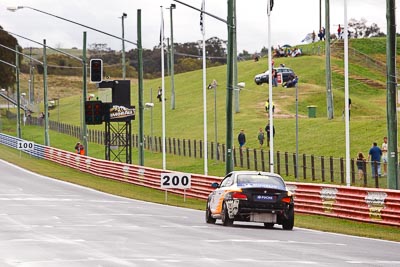 68;26-February-2012;68;Aaron-Harris;Australia;BMW-135i;Bathurst;Bathurst-12-Hour;David-Glasson;Dennis-Roderick;Motorsport-Services;Mt-Panorama;NSW;New-South-Wales;auto;endurance;motorsport;racing;rain;telephoto;wet