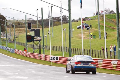 28;26-February-2012;Australia;BMW-335i;Bathurst;Bathurst-12-Hour;Christian-DAgostin;GWS-Personnel-Motorsport;Garth-Duffy;Mt-Panorama;NSW;New-South-Wales;Peter-ODonnell;auto;endurance;motorsport;racing;rain;telephoto;wet