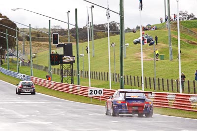 3;26-February-2012;3;Australia;Bathurst;Bathurst-12-Hour;Hunter-Sports-Group;Mt-Panorama;NSW;Nathan-Tinkler;New-South-Wales;Porsche-911-GT3-Cup-997;Steven-Johnson;Steven-Richards;Tinkler-Motorsports;auto;endurance;motorsport;racing;rain;telephoto;wet