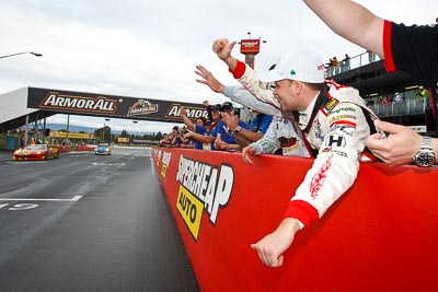 26-February-2012;Australia;Bathurst;Bathurst-12-Hour;Clearwater-Racing;Matt-Griffin;Mt-Panorama;NSW;New-South-Wales;atmosphere;auto;celebration;endurance;motorsport;paddock;pitlane;portrait;racing;wide-angle