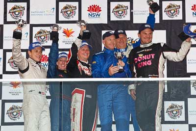 26-February-2012;Adam-Beechey;Anthony-Alford;Australia;Bathurst;Bathurst-12-Hour;Christian-Klien;Mt-Panorama;NSW;New-South-Wales;Peter-Leemhuis;Robert-Thomson;Sarah-Harley;atmosphere;auto;celebration;endurance;motorsport;podium;racing;telephoto