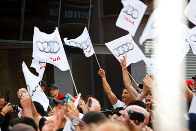 26-February-2012;Australia;Bathurst;Bathurst-12-Hour;Mt-Panorama;NSW;New-South-Wales;atmosphere;auto;celebration;crowd;endurance;fans;flags;motorsport;podium;racing;spectators;telephoto