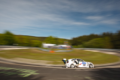 107;17-May-2012;24-Hour;BMW-130i-GTR;Deutschland;Germany;Green-Hell;Grüne-Hölle;Karussell;Konstantin-Wolf;Nuerburg;Nuerburgring;Nurburg;Nurburgring;Nürburg;Nürburgring;Patrick-Rehs;Ralf-Reinolsmann;Rhineland‒Palatinate;Sascha-Rehs;auto;clouds;endurance;motion-blur;motorsport;racing;sky;wide-angle