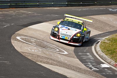 11;11;17-May-2012;24-Hour;Deutschland;Germany;Green-Hell;Grüne-Hölle;Karussell;Lucas-Luhr;Marc-Lieb;Nuerburg;Nuerburgring;Nurburg;Nurburgring;Nürburg;Nürburgring;Porsche-911-GT3-R-997;Rhineland‒Palatinate;Richard-Lietz;Romain-Dumas;Wochenspiegel-Team-Manthey;auto;endurance;motorsport;racing;telephoto