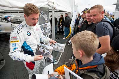 19-May-2012;24-Hour;BMW-Team-Schubert;Deutschland;Germany;Green-Hell;Grüne-Hölle;Nico-Bastian;Nuerburg;Nuerburgring;Nurburg;Nurburgring;Nürburg;Nürburgring;Rhineland‒Palatinate;Topshot;atmosphere;auto;autograph;child;endurance;kid;memorabilia;motorsport;paddock;poster;racing;spectators;wide-angle