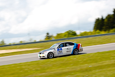 204;20-May-2012;24-Hour;Andreas-Schwarz;BMW-E90-320-Si;Christian-Sporenberg;Deutschland;Germany;Green-Hell;Grüne-Hölle;Michael-Holz;Nuerburg;Nuerburgring;Nurburg;Nurburgring;Nürburg;Nürburgring;Peter-Bonk;Rhineland‒Palatinate;auto;endurance;motion-blur;motorsport;racing;telephoto