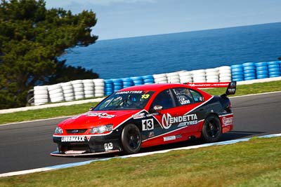 13;13;22-September-2012;Australia;Bobby-Jane;Ford-Falcon-BA;Phillip-Island;Shannons-Nationals;V8-Touring-Cars;VIC;Victoria;auto;motorsport;ocean;racing;telephoto