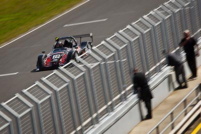 29;22-September-2012;29;Andy-Plummer;Australia;Phillip-Island;Radical;Shannons-Nationals;VIC;Victoria;auto;fence;motion-blur;motorsport;racing;telephoto