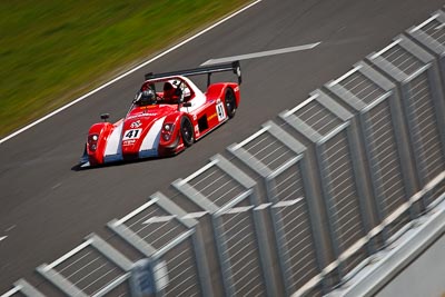 41;22-September-2012;Australia;Neale-Muston;Phillip-Island;Radical;Shannons-Nationals;VIC;Victoria;auto;fence;motion-blur;motorsport;racing;telephoto