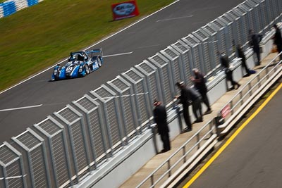17;17;22-September-2012;Australia;Peter-Johnston;Phillip-Island;Radical;Shannons-Nationals;VIC;Victoria;auto;fence;motion-blur;motorsport;racing;telephoto