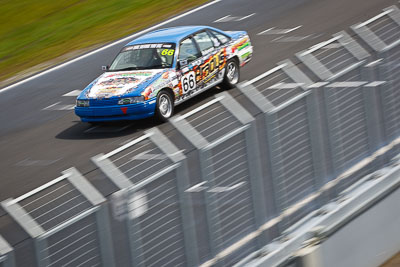 66;23-September-2012;Aarron-Paterson;Australia;Holden-Commodore-VN;Phillip-Island;Saloon-Cars;Shannons-Nationals;VIC;Victoria;auto;fence;motion-blur;motorsport;racing;telephoto