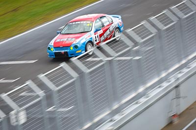 41;23-September-2012;Australia;Dennie-Rumble;Ford-Falcon-AU;Phillip-Island;Saloon-Cars;Shannons-Nationals;VIC;Victoria;auto;fence;motion-blur;motorsport;racing;telephoto