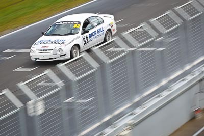 52;23-September-2012;52;Australia;Ford-Falcon-AU;Phillip-Island;Rick-Gill;Saloon-Cars;Shannons-Nationals;VIC;Victoria;auto;fence;motion-blur;motorsport;racing;telephoto