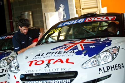 7-February-2013;Australia;Bathurst;Bathurst-12-Hour;Grand-Tourer;Mt-Panorama;NSW;New-South-Wales;Team-Peugeot-RCZ;atmosphere;auto;endurance;mechanics;motorsport;pitlane;racing;telephoto