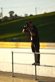 7-February-2013;Australia;Bathurst;Bathurst-12-Hour;Dirk-Klynsmith;Grand-Tourer;Mt-Panorama;NSW;New-South-Wales;afternoon;atmosphere;auto;endurance;motorsport;photographer;pitlane;portrait;racing;telephoto