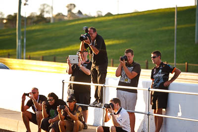 7-February-2013;Australia;Bathurst;Bathurst-12-Hour;Dirk-Klynsmith;Grand-Tourer;Mt-Panorama;NSW;New-South-Wales;Topshot;afternoon;atmosphere;auto;endurance;group;motorsport;photographer;pitlane;portrait;racing;telephoto