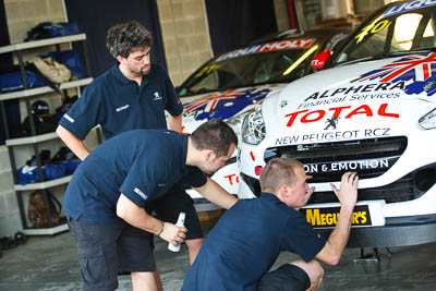 7-February-2013;Australia;Bathurst;Bathurst-12-Hour;Grand-Tourer;Mt-Panorama;NSW;New-South-Wales;Team-Peugeot-RCZ;atmosphere;auto;endurance;mechanics;motorsport;pitlane;portrait;racing;telephoto