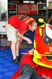 7-February-2013;Australia;Bathurst;Bathurst-12-Hour;Clearwater-Racing;Grand-Tourer;Mt-Panorama;NSW;New-South-Wales;atmosphere;auto;endurance;mechanics;motorsport;pitlane;portrait;racing;telephoto