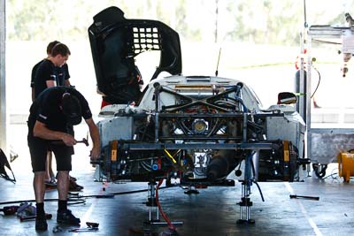 51;51;8-February-2013;Andrew-MacPherson;Australia;Bathurst;Bathurst-12-Hour;Ben-Porter;Garth-Walden;Grand-Tourer;IMAKKWIKMIT;Mosler-MT900-GT3;Mt-Panorama;NSW;New-South-Wales;Topshot;atmosphere;auto;endurance;mechanics;motorsport;paddock;racing;repair;telephoto