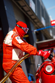 8-February-2013;AF-Corse;Australia;Bathurst;Bathurst-12-Hour;Ferrari-458-Italia-GT3;Fire-Suit;Grand-Tourer;Mt-Panorama;NSW;New-South-Wales;atmosphere;auto;endurance;fuel-man;motorsport;paddock;pitlane;portrait;racing;refuel;telephoto