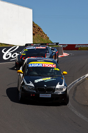 26;26;8-February-2013;Australia;BMW-130i;Bathurst;Bathurst-12-Hour;Daniel-Lewis;Daniel-Studdart;GWS-Personnel-Motorsport;Grand-Tourer;Jonathan-Venter;Mt-Panorama;NSW;New-South-Wales;The-Dipper;auto;endurance;motorsport;racing;telephoto