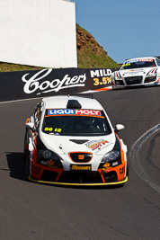 56;56;8-February-2013;Australia;Bathurst;Bathurst-12-Hour;Grand-Tourer;Kerry-Wade;Mark-Pilatti;Motorsport-Services;Mt-Panorama;NSW;New-South-Wales;Seat-Leon-Supercopa;Simon-Piauaninj;The-Dipper;auto;endurance;motorsport;racing;telephoto