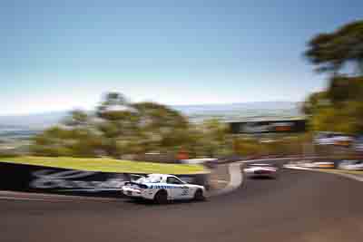 35;35;8-February-2013;Andrew-Bollom;Australia;Bathurst;Bathurst-12-Hour;Grand-Tourer;James-Parish;Mazda-RX‒7;Mazda-RX7;Mt-Panorama;NSW;New-South-Wales;Ric-Shaw;Ric-Shaw-Racing;Stephen-Borness;The-Dipper;auto;endurance;motion-blur;motorsport;racing;sky;wide-angle